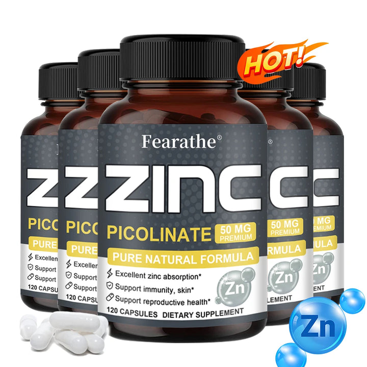 Five bottles of Fearathe Zinc 50 Mg Picolinate supplement with 120 capsules each, and loose capsules